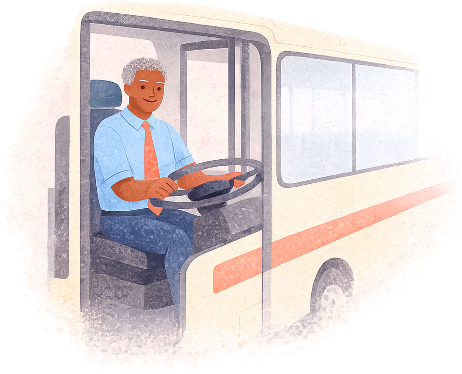 An older bus driver with grey curls, in a blue shirt and coral tie, at the wheel of a cream bus